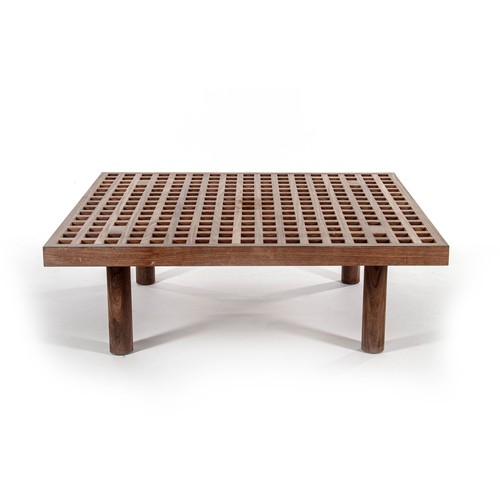 1084 - AN AFROMOSIA PATIO TABLE