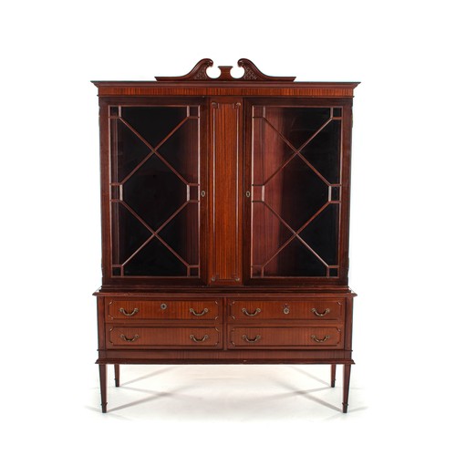 1004 - A GEORGE III STYLE MAHOGANY BOOKCASE ON CHEST