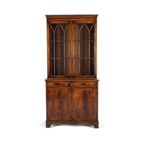 1005 - A GEORGE III STYLE MAHOGANY BOOKCASE CABINET