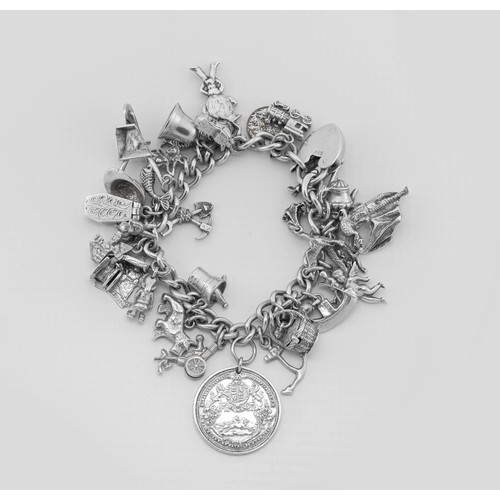 966 - A SILVER CHARM BRACELET