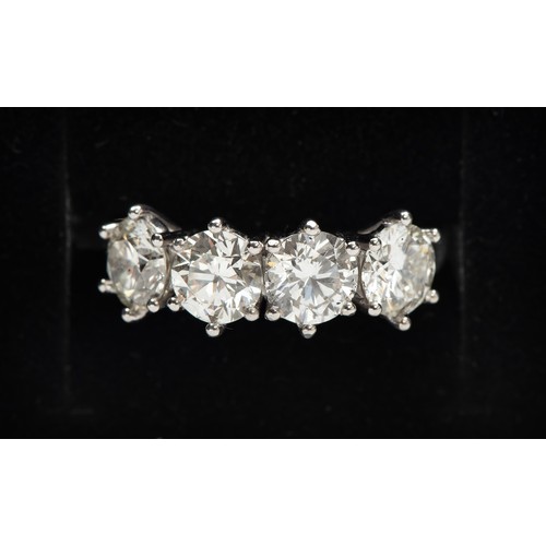 907 - A NATURAL DIAMOND ETERNITY RING, 2.95 CARATS