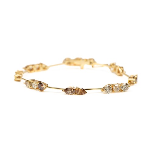 31 - A PAIR OF MATCHING NATURAL COLOURED DIAMOND TENNIS BRACELETS, 10.36 CARATS