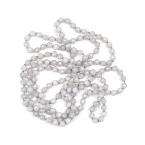 144 - A CHINESE KNOTTED WHITE AGATE NECKLACE