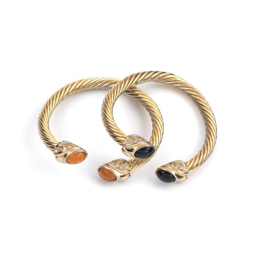 133 - A PAIR OF GEMSTONE BANGLES