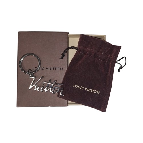 3007 - A LOUIS VUITTON PORTOCLE AUTOGRAPH KEY RING