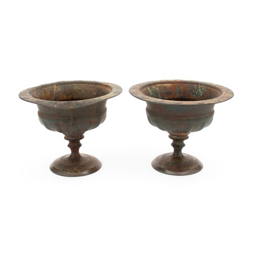 475 - A PAIR OF SMALL PEDESTAL GARDEN URNS