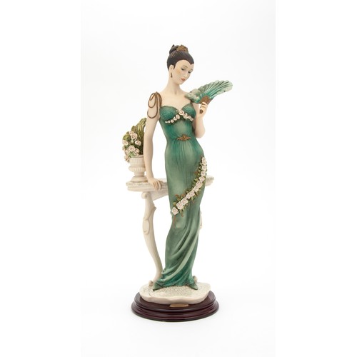 9052 - A CERAMIC FIGURINE 