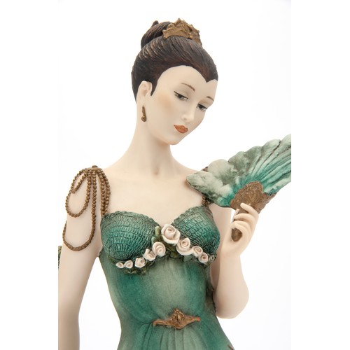 9052 - A CERAMIC FIGURINE 