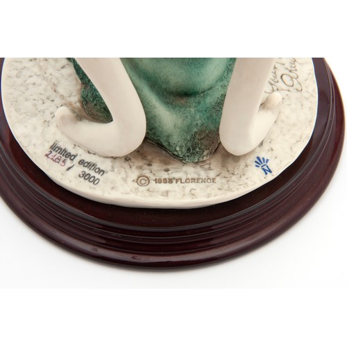 9052 - A CERAMIC FIGURINE 