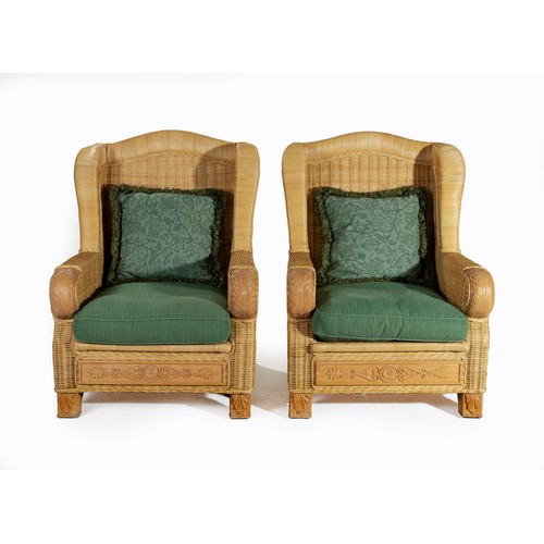 337 - A PAIR OF WICKER PATIO ARMCHAIRS