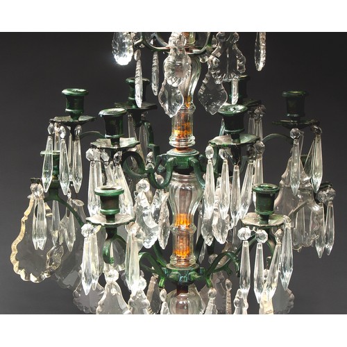 603 - A FRENCH GIRANDOLE TWELVE LIGHT BRASS AND CRYSTAL CANDELABRA