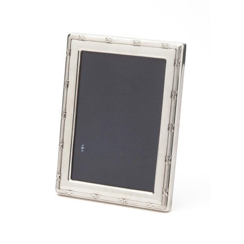 1102 - A SILVER-PLATE PICTURE FRAME