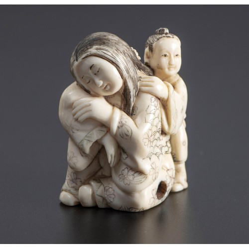 251 - A JAPANESE MARINE TUSK NETSUKE