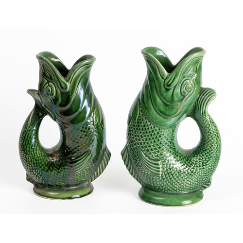 531 - TWO DARTMOUTH POTTERY FISH JUGS