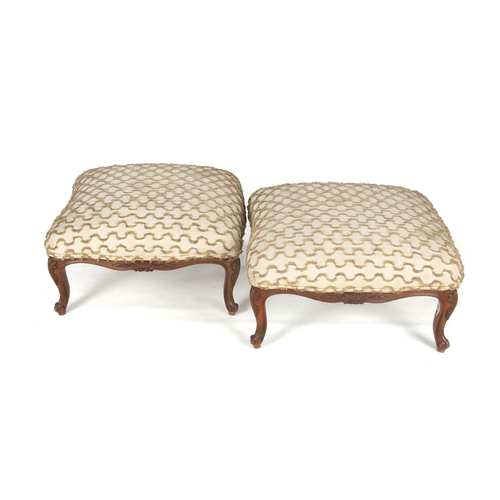 394 - A PAIR OF UPHOLSTERED OTTOMANS