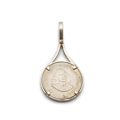 701 - A SILVER COIN PENDANT