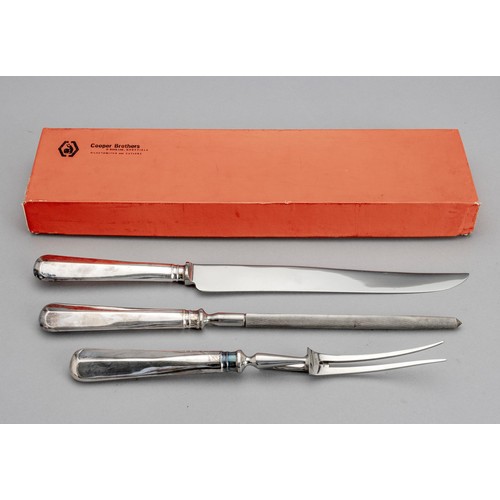 1112 - A CASED STAINLESS STEEL CARVING SET, COOPER BROTHERS AND SONS LTD