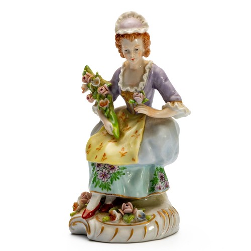 384 - A SITZENDORF GERMAN PORCELAIN FIGURINE, FEMALE FLOWER SELLER