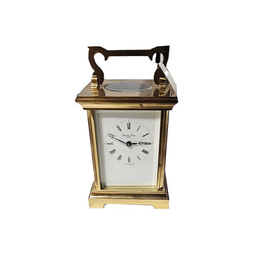 A BRASS CARRIAGE CLOCK, CHARLES GREIG 1899