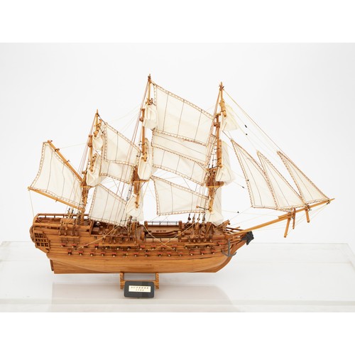 A CASED WOODEN MODEL SAILING SHIP