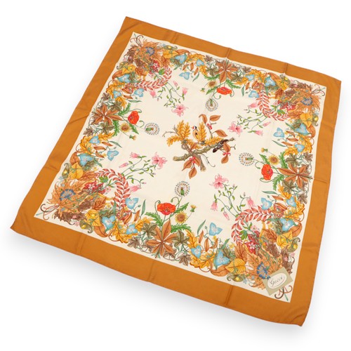 A GUCCI ACCORNERO FLORAL PRINT SILK SCARF, CIRCA 1990