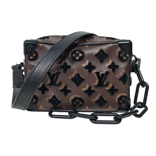 11 - A LOUIS VUITTON SOFT TRUNK HAND BAG