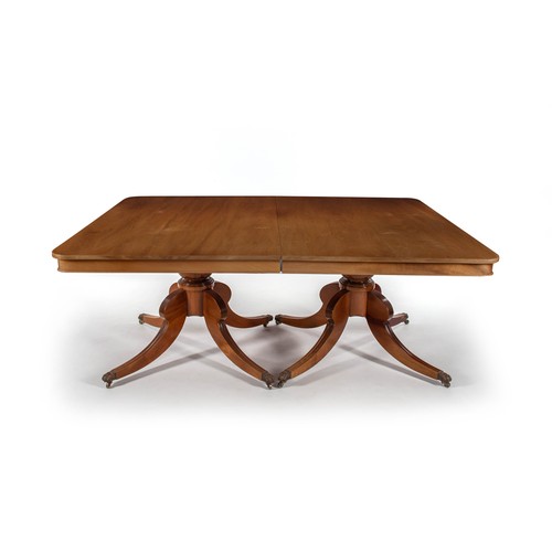 A REGENCY STYLE TWIN PEDESTAL MAHOGANY EXTENDING DINING TABLE, MANUFACTURED BY PIERRE CRONJE
