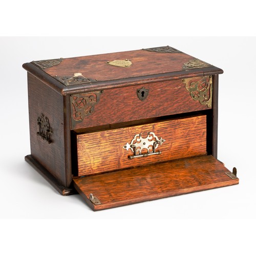 9 - A WOODEN AND BRASS-MOUNTED CIGAR HUMIDOR