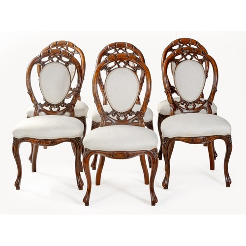 1283 - A SET OF SIX WALNUT DINING CHAIRS