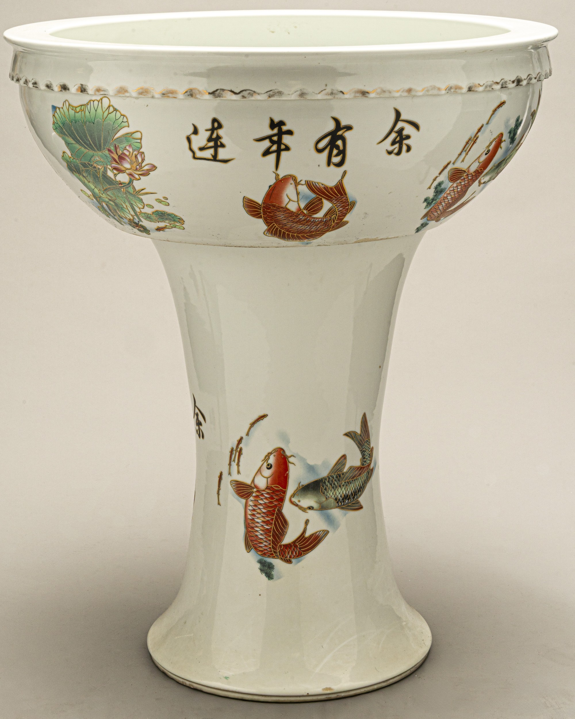 A CHINESE CERAMIC CACHE POT AND STAND