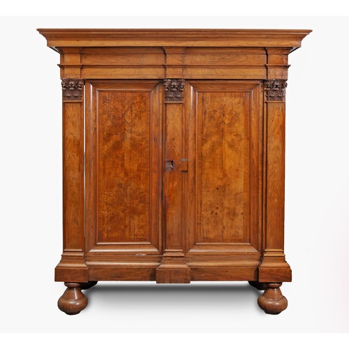 A DUTCH WALNUT CABINET, 18TH CENTURY