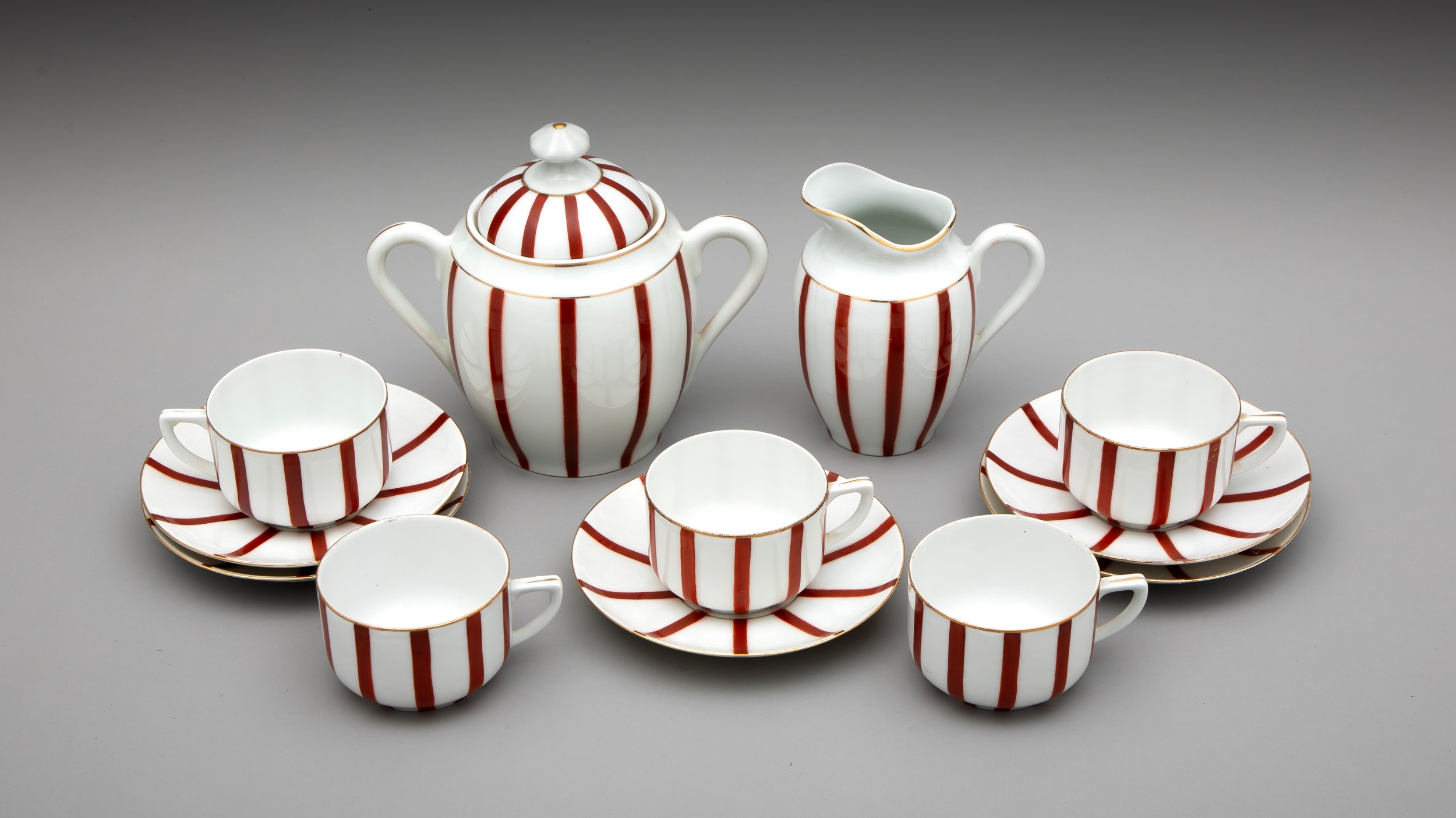 A RED AND WHITE STRIPED TEA SET, CZECHOSLOVAKIA