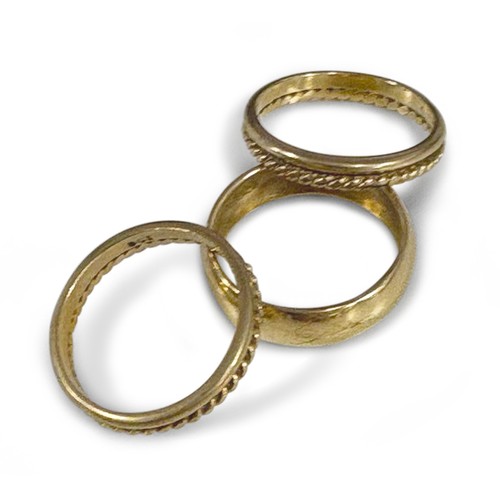 756 - A SET OF THREE GOLD RINGS