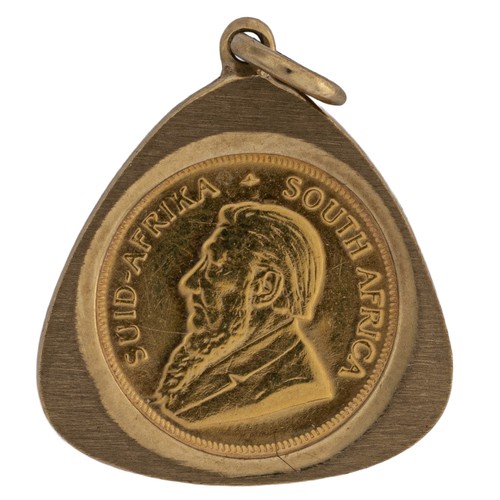 719 - A GOLD COIN PENDANT