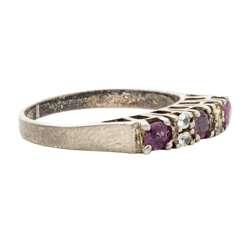 727 - A GARNET AND CUBIC ZIRCONIA ETERNITY RING