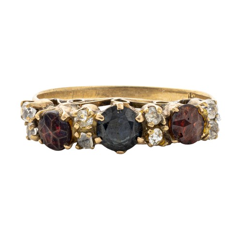 726 - A GARNET AND NATURAL DIAMOND ETERNITY RING