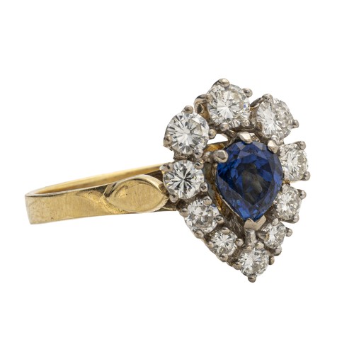 729 - A SAPPHIRE AND NATURAL DIAMOND CLUSTER RING