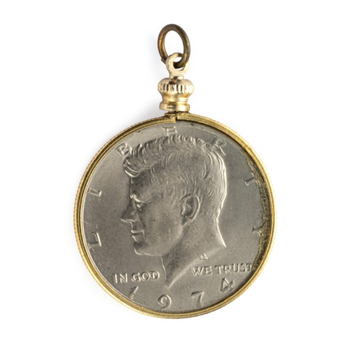 242 - A GILT FRAMED USA HALF DOLLAR PENDANT