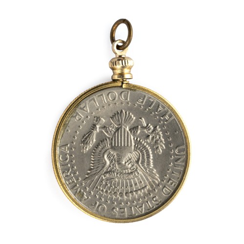 242 - A GILT FRAMED USA HALF DOLLAR PENDANT
