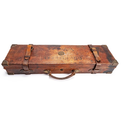 A LEATHER AND BRASS BOUND SHOTGUN CASE, GEORGE H. DAY, LONDON