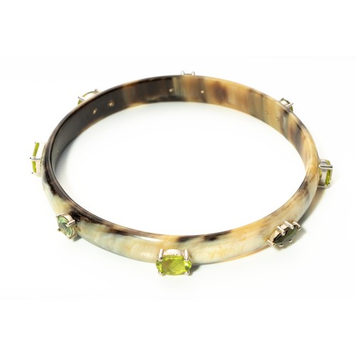 153 - A GEM SET BONE BANGLE