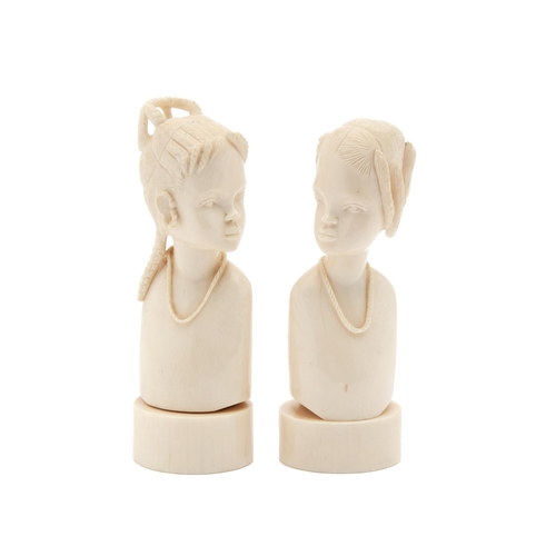 43 - A PAIR OF CARVED TUSK FIGURINES