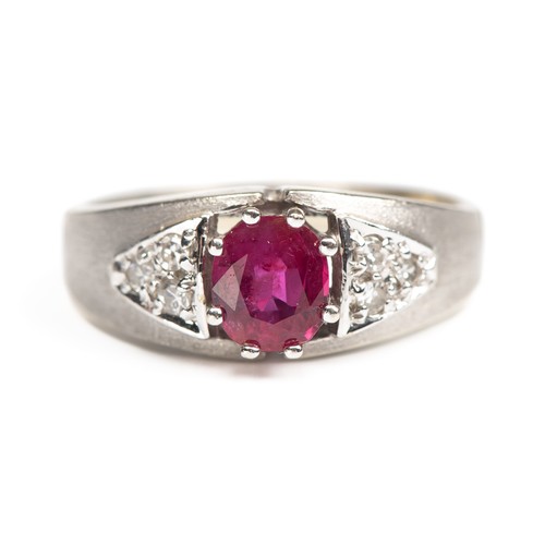 A NATURAL DIAMOND AND RUBY DRESS RING