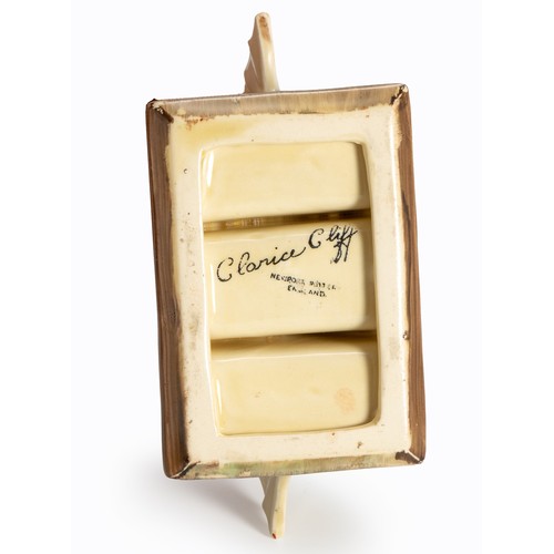 133 - A CLARICE CLIFF EARTHENWARE TOAST RACK