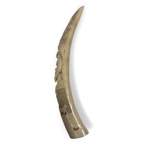51 - AN AFRICAN TUSK ORNAMENT, CIRCA 1850