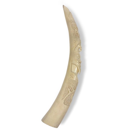 51 - AN AFRICAN TUSK ORNAMENT, CIRCA 1850