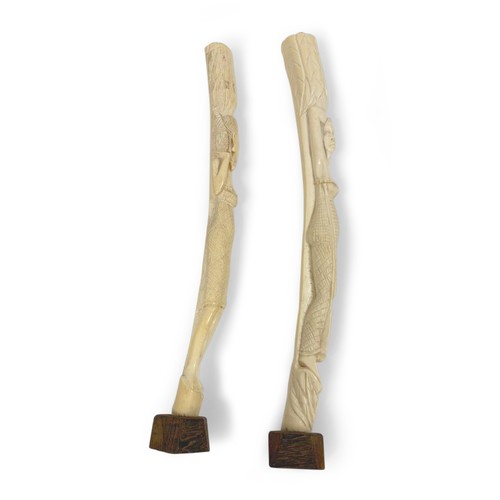 49 - A PAIR OF AFRICAN TUSK ORNAMENTS, CIRCA 1900