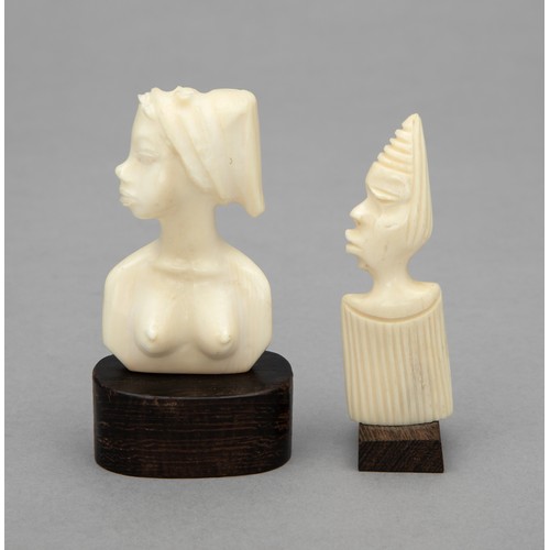 44 - A PAIR OF CARVED TUSK MINIATURE FIGURINES, ONE SIGNED 'TSH'