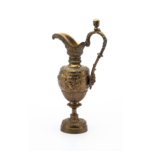 210 - A BRONZE ORNAMENTAL JUG