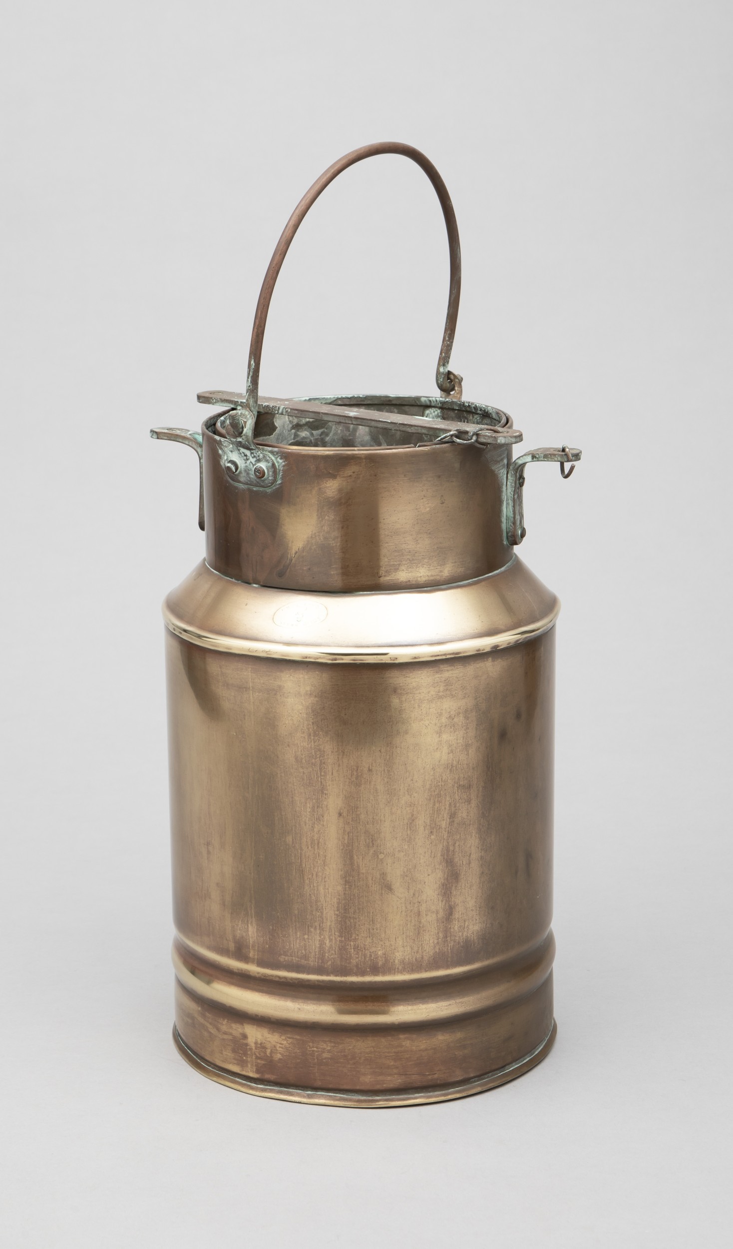 A BRASS MILK PAIL
